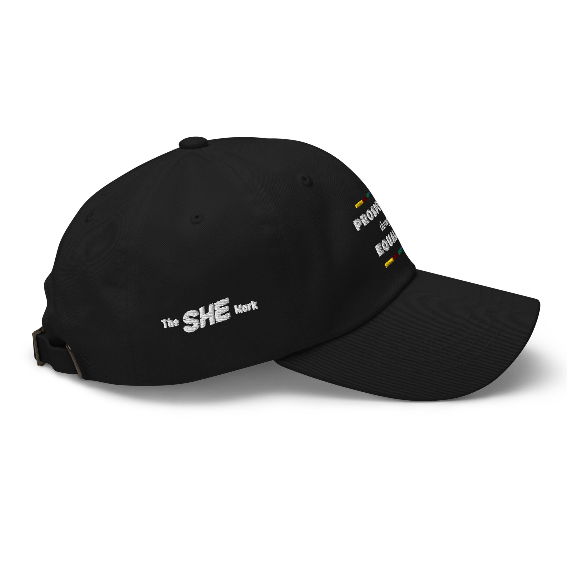 On the right side of the hat is embroidered in white "The SHE Mark."