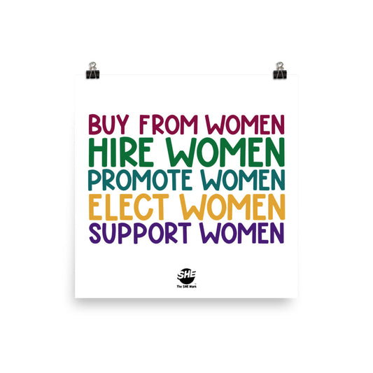 White square posted with "Buy from women" in ruby, followed by "Hire women" in green, "Promote women" in teal, "Elect women" in gold, and "Support women" in purple. Below the text is a small, black SHE Mark logo, and below that reads "The SHE Mark" in black text.