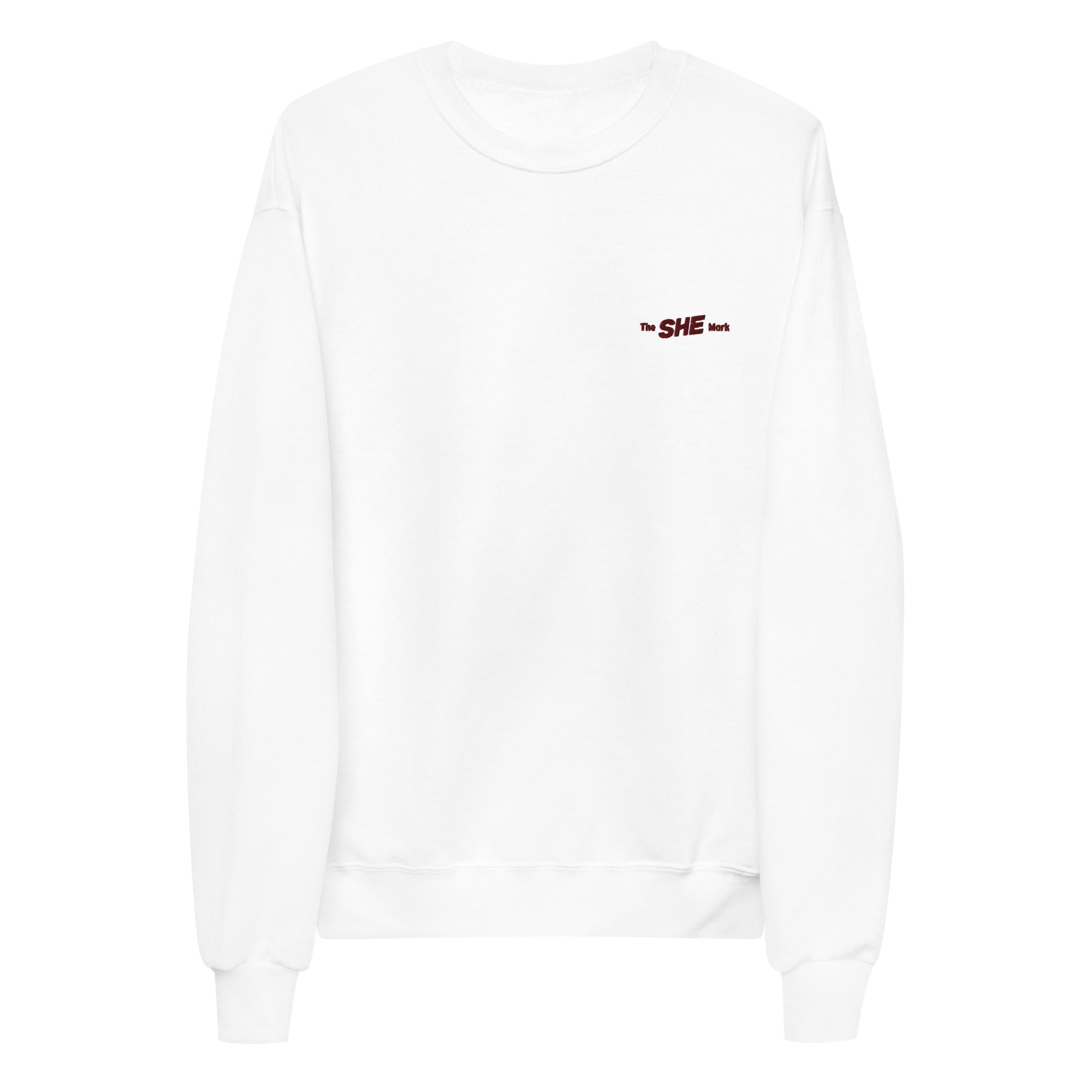 White crewneck sweatshirt with "the SHE Mark" embroidered on the left chest in black.
